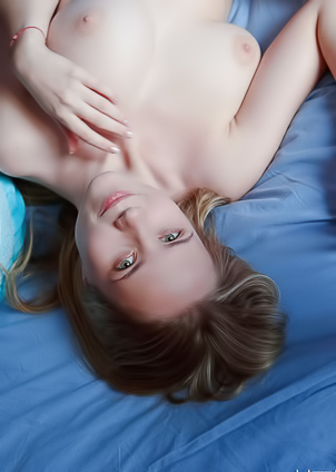 Delizi bows to the camera, submission in every curve, legs parting lazily
